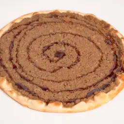 لحم بالعجين (دبس رمان)